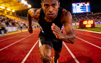 田径世锦赛百米飞人大战 - 运动员在跑道上冲刺，表情专注